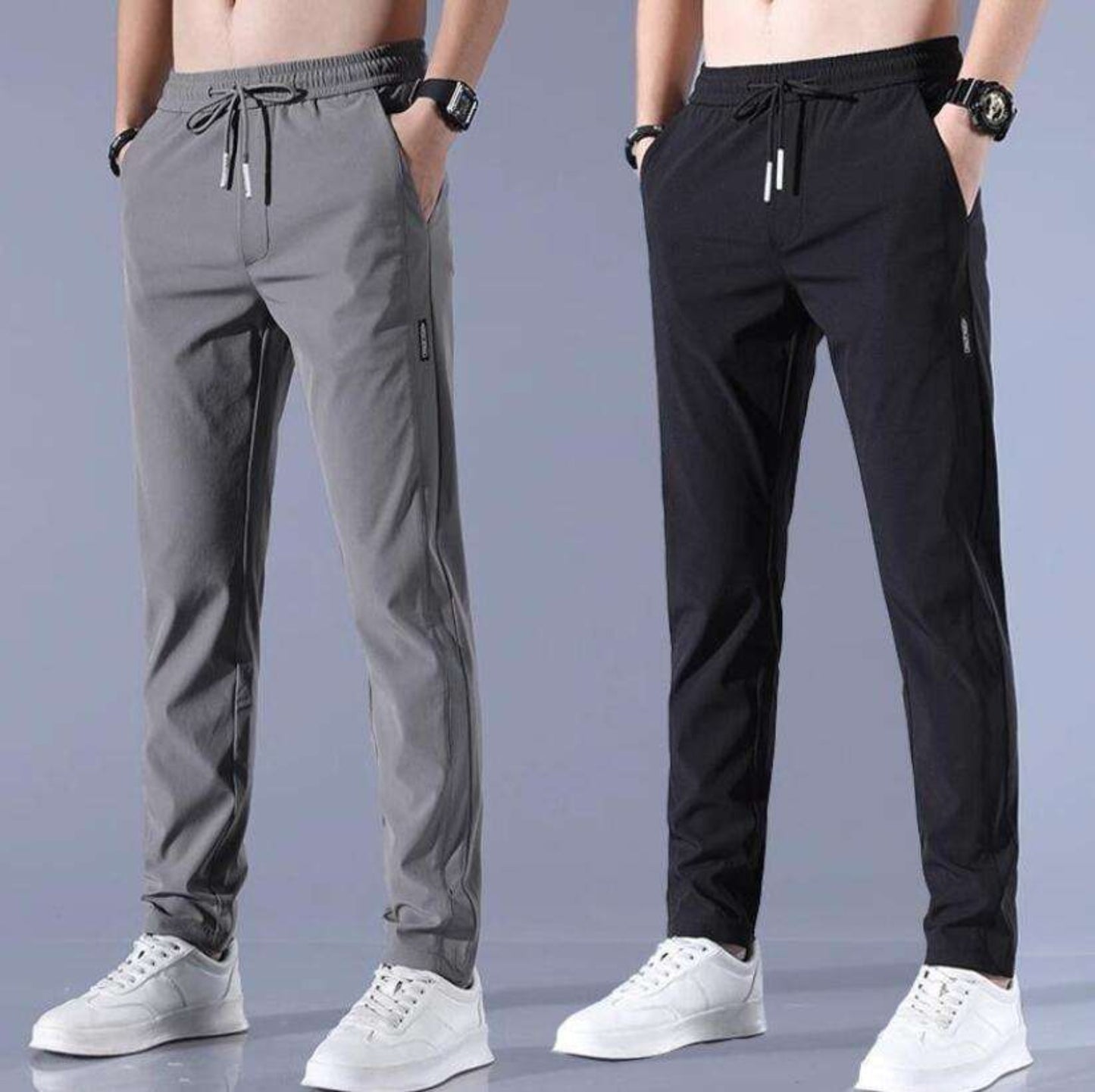 Two pairs of pants, one gray and one black, worn by models on a plain background.