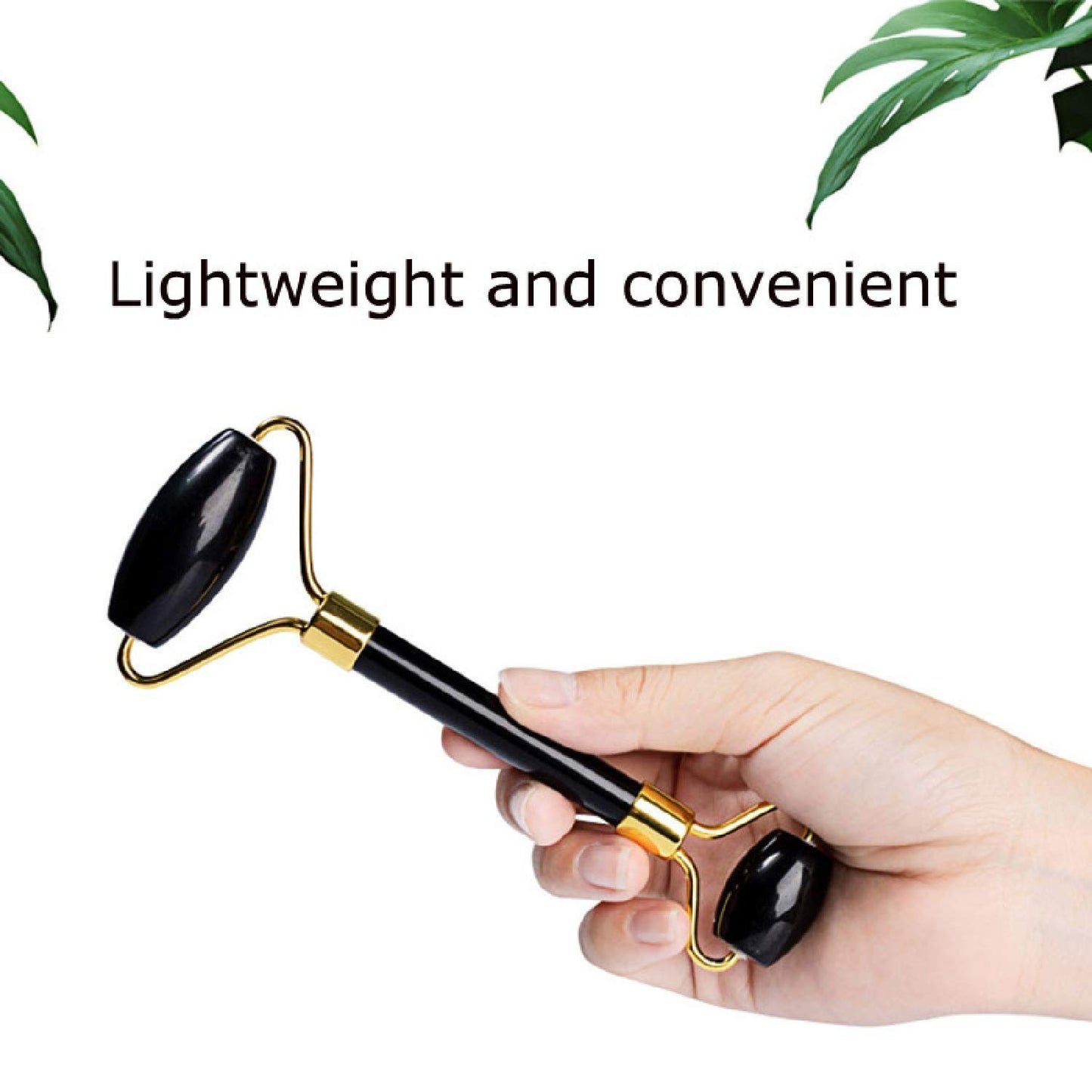 Hand holding a black and gold facial roller with text 'Lightweight and convenient' on a white background.