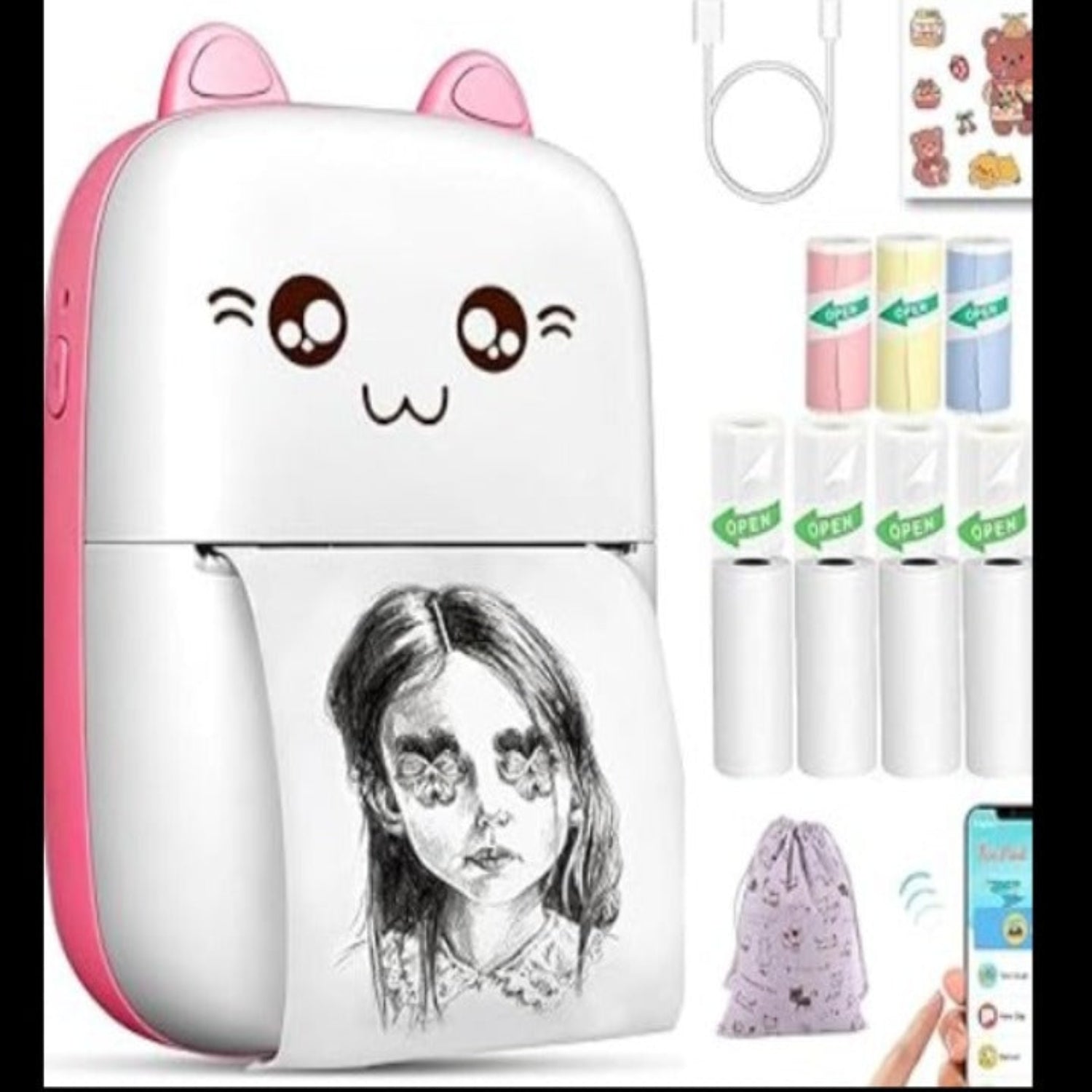 Cute cartoon-style portable device with a person's face printed on it, surrounded by small items.