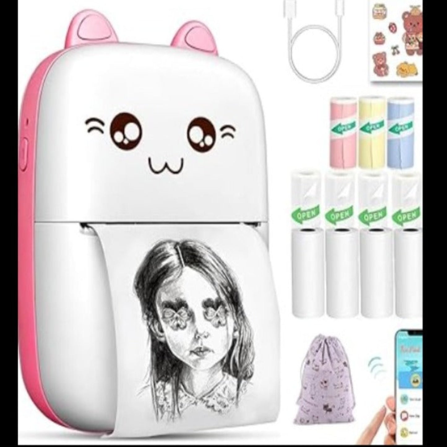 Cute cartoon-style portable device with a person's face printed on it, surrounded by small items.