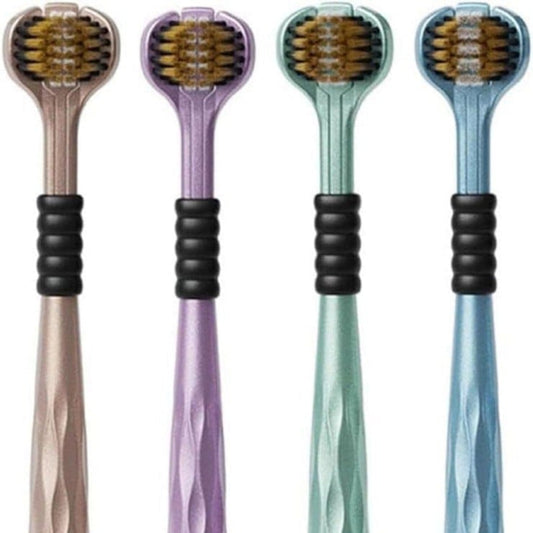 Four toothbrushes with diamond-patterned handles in different colors on a white background