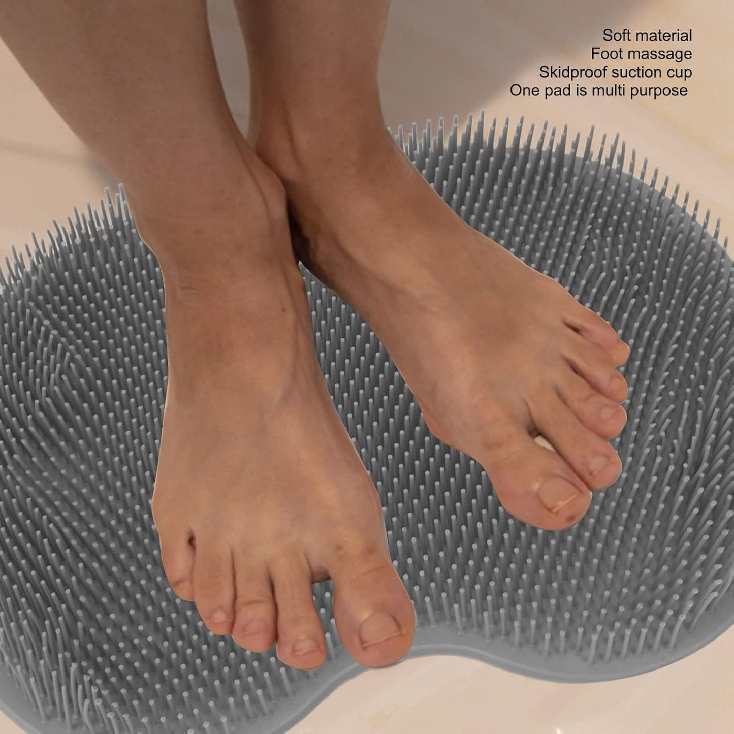 Person using a gray foot massage mat with text on material and features.grandsell